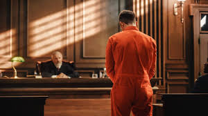 "stand trial" picture